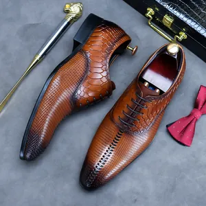 Brown leather oxfords with crocodile texture, gradient toe, and professional briefcase