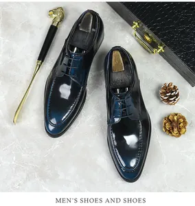 Macro detail of gradient blue-black polished leather derby shoes with moccasin stitching