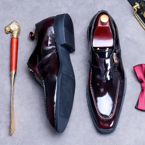 Polished burgundy leather monk strap shoes for men with single buckle and non-slip sole