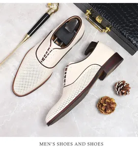 Klassische Herren-Oxford-Schuhe aus cremefarbenem Leder mit eleganter Perforation