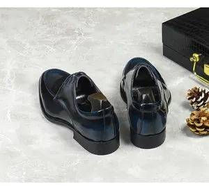 Detail of premium blue hand-painted patina leather shoes with luxury wooden shoe trees