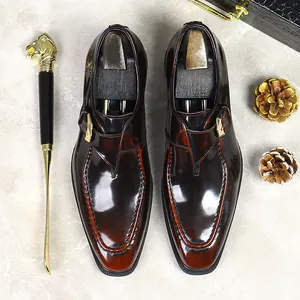 Polished leather monk strap shoes with gradient finish, shoe trees and lion head horn