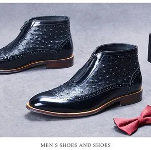 Detail of ostrich pattern leather and Brogue carving on men's black front-zip boots