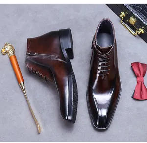 Détails de bottines en cuir marron dégradé avec fermeture éclair latérale et bout pointu