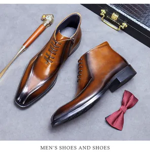 Gros plan de bottines en cuir marron pointues avec dégradé et fermeture éclair latérale