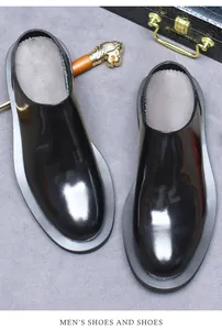 Top view of shiny black patent leather mules for men with refined Italian gentleman styling