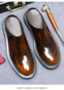 Detailed top view of brown polished leather mule shoes with a vintage gradient finish