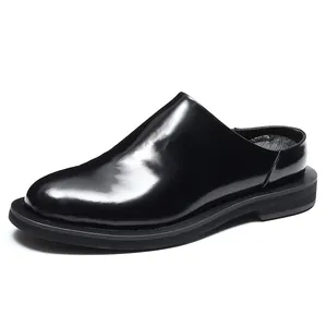 Polished black leather mule slipper with a minimalist design and thick sole for men