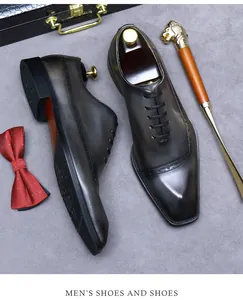 Klassische Brogue-Schuhe aus Leder für Herren mit edlen Details und Business-Zubehör
