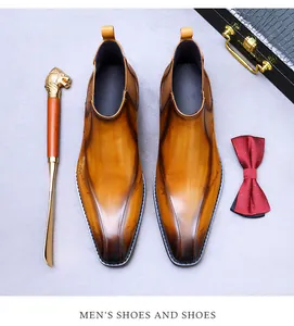 Vue de dessus de bottines Chelsea en cuir marron dégradé avec des détails de couture vintage