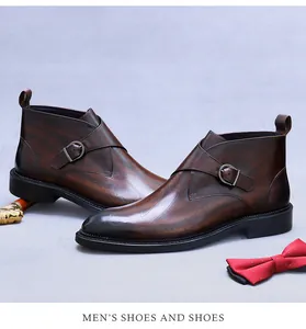 Detail of premium brown leather monk-strap boot with artistic script embossing and vintage finish