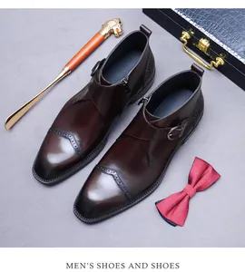 Macro view of dark brown leather monk boots with brogue detailing and side zippers