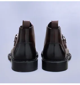 Rear view of leather monk strap boots with polished finish and silver buckle