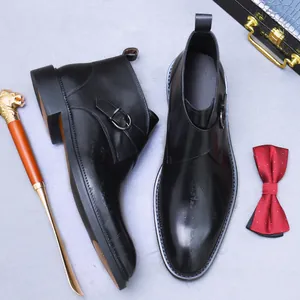 Men's premium black leather monk strap boots with artistic script engraving and thick sole