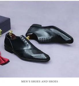 Detail of embossed cowhide leather dress shoe with elegant script and classic laces