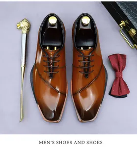 Top view of dark brown gradient leather formal oxfords with accessories on purple background