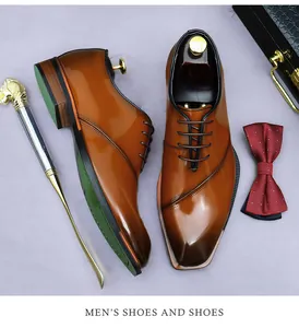 Close-up of brown leather dress shoes with horse-head shoehorn and polka-dot bowtie