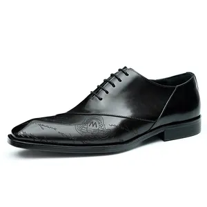 Classic men's black leather oxford shoes with elegant shield logo and formal lace-up design