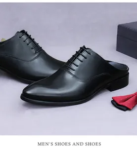 Business casual black leather mule shoes with lace-up detail on lavender background