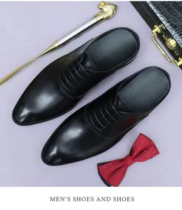 Detail of men's black leather mules with laces next to elegant formal accessories