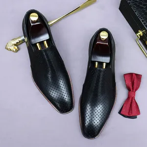 Men's black hollow leather loafers with breathable cutout design for summer business style