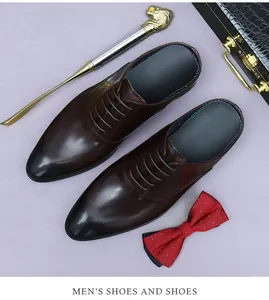 Close-up of brown leather men's mules with lace-up design and gradient finish