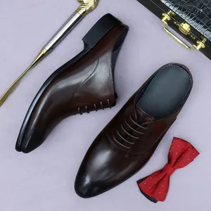 Men's dark brown leather mule loafers with lace-up detail on a formal purple background
