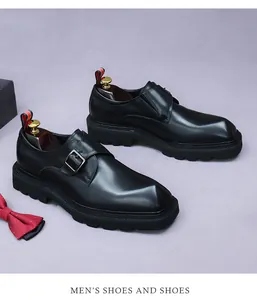 Detail of black monk strap shoe featuring thick lug sole and silver metal buckle