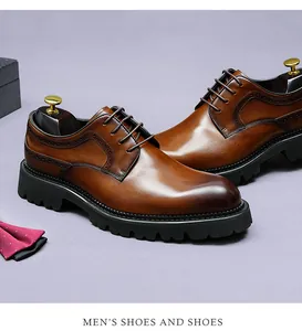 Detail of brown leather Derby shoes featuring Brogue carving and thick rubber soles