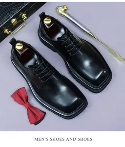 Flat lay of men's square-toe leather shoes with briefcase, shoehorn and bowtie