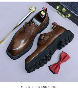 Detail of brown leather monk strap shoe with single buckle and chunky rubber lug sole