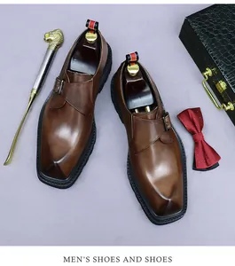 Detail of dark brown monk strap leather shoe with buckle and thick sole display