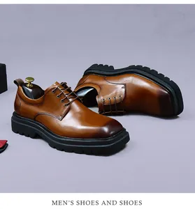 Detail of brown leather men's dress shoe featuring gradient toe and thick rubber sole