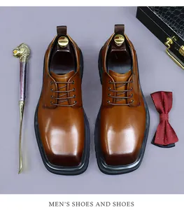 Overhead view of brown leather derby shoes with gradient finish and square toe detail