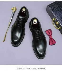 Men's leather derby shoes with classic accessories and a decorative shoehorn
