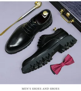 Detail of black leather brogue shoes featuring a thick anti-slip sole and lace-up design