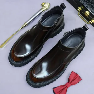 Business casual dark brown polished leather Chelsea boots with thick rubber soles