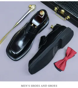 Polished black leather loafers for men with anti-slip rubber soles and business styling