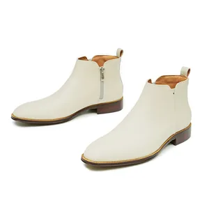 Classic beige leather Chelsea boots for men with side zipper and stylish wooden mid-heel