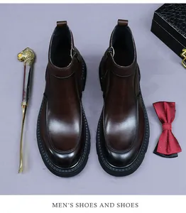 Botines Chelsea de cuero marrón oscuro con cremallera y accesorios de negocios