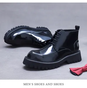 Detail of black patent leather platform boots with lace-up front and side zipper for men