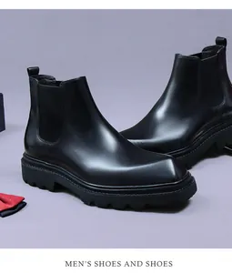 Macro detail of men's leather Chelsea boot featuring square toe and thick rubber sole