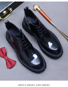 Detailed top view of black patent leather boots with side zipper and thick non-slip soles