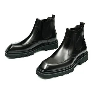 Classic black leather Chelsea boots for men with thick rubber soles and elastic side panels