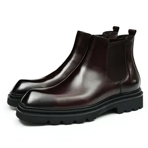 Classic dark burgundy leather Chelsea boots with square toe and thick rubber lug sole