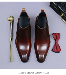 Détail de bottines Chelsea en cuir dégradé marron avec accessoires élégants