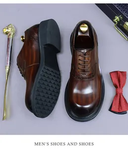 Close-up of brown brogue shoes with decorative perforation and non-slip rubber soles