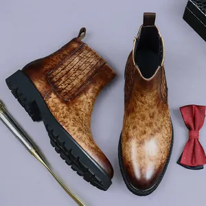 Men's brown marbled leather Chelsea boots with platform rubber sole and elastic side panels