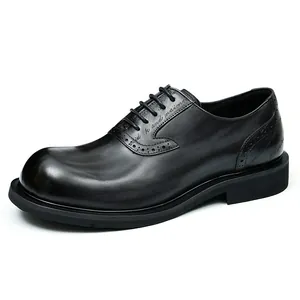 Classic black leather Brogue shoes for men with elegant engraving and thick sole