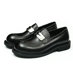 Men's black leather loafers with silver metal buckle and chunky rubber sole